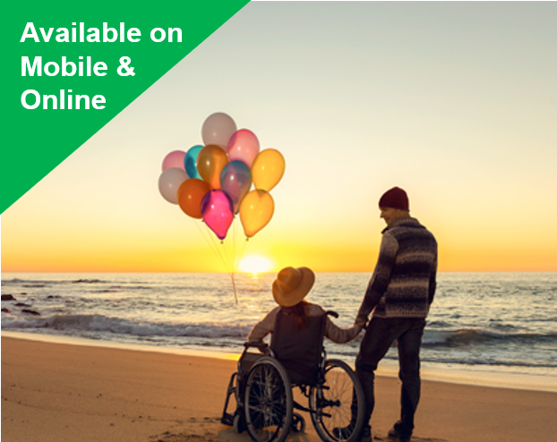 One man with another person in wheelchair who is holding a bunch of ballons