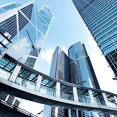 worm's eye view of tall financial buildings in hong kong