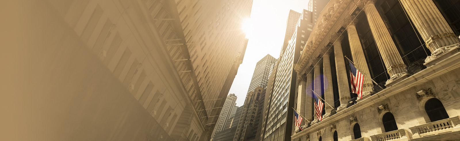 sunshine coming through the space between buildings