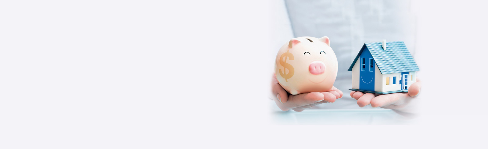 手上捧著小豬儲蓄箱及房屋模型